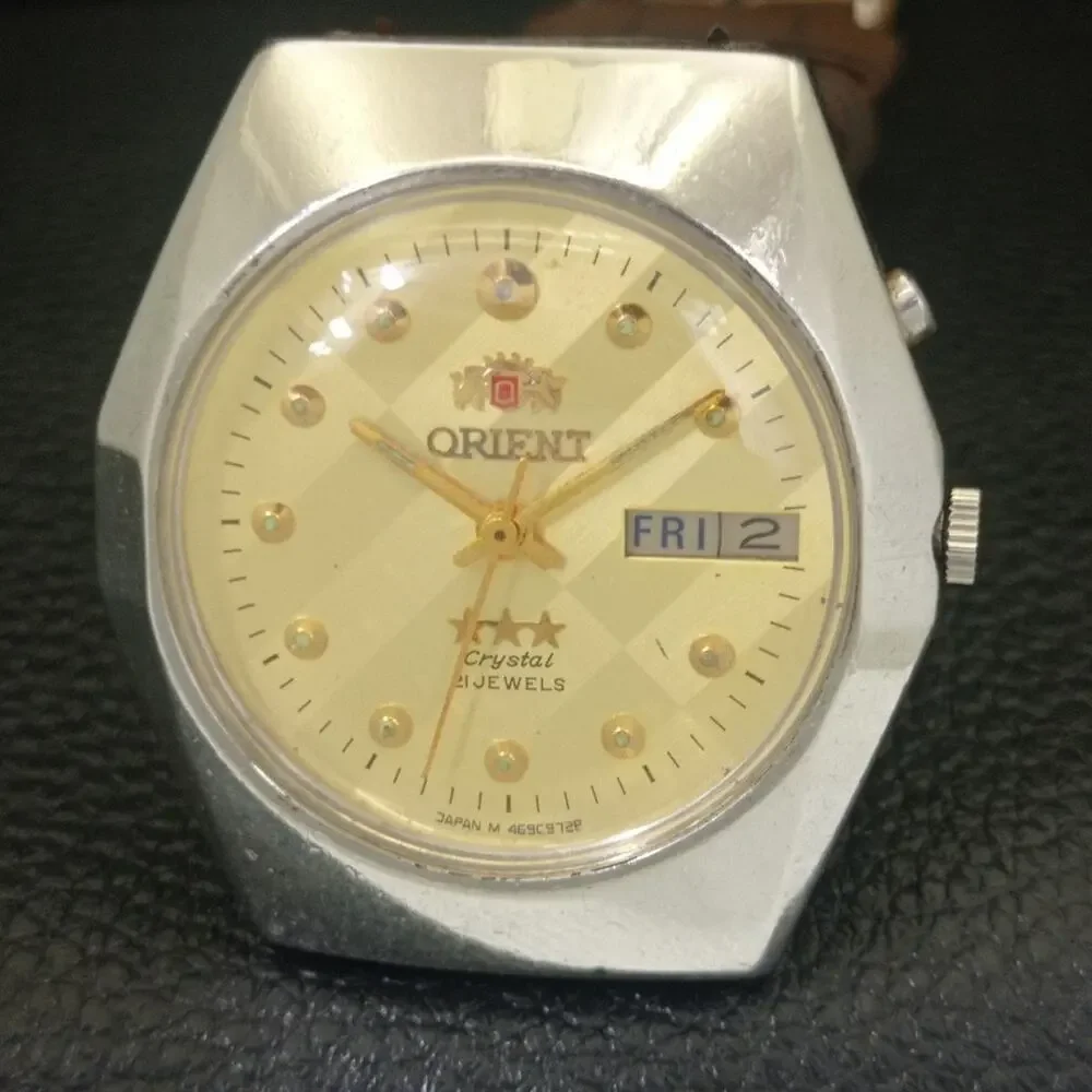 Vintage 1976 Orient Automatic Mens Silver Watch W/daydate & Gold accents